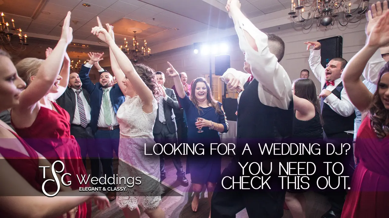 Wedding guests celebrating together on the dance floor